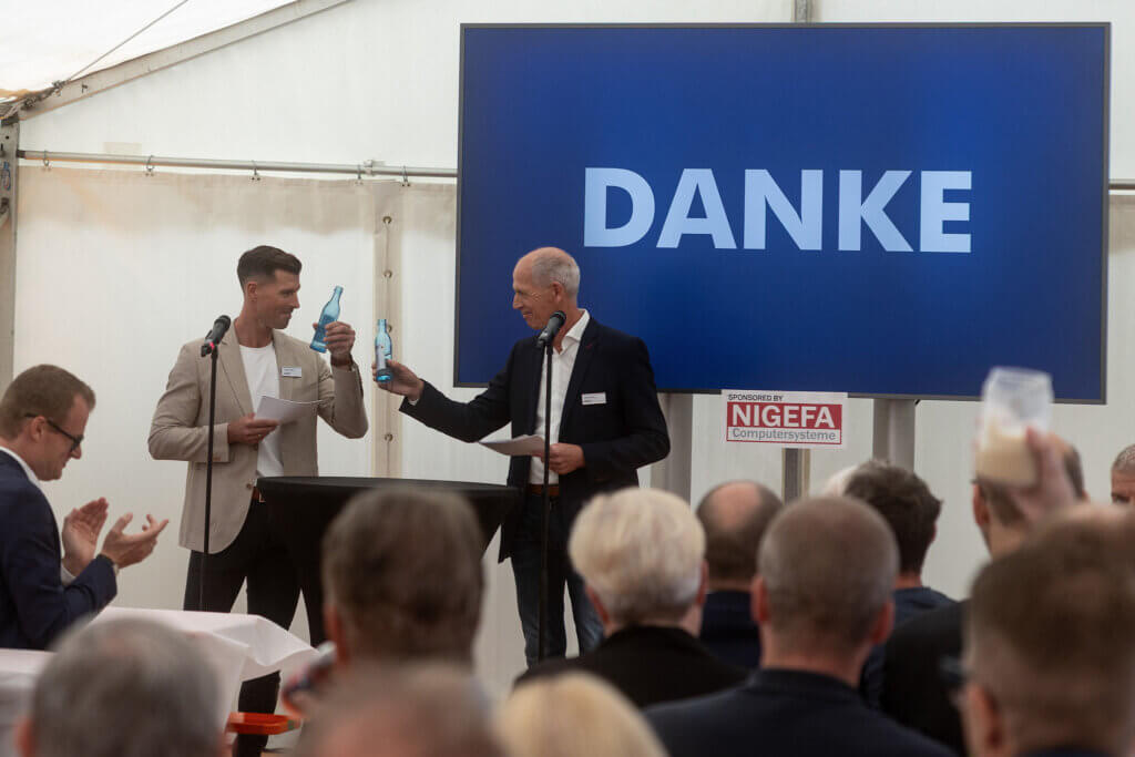 Fabian and Achim Kopp give speech